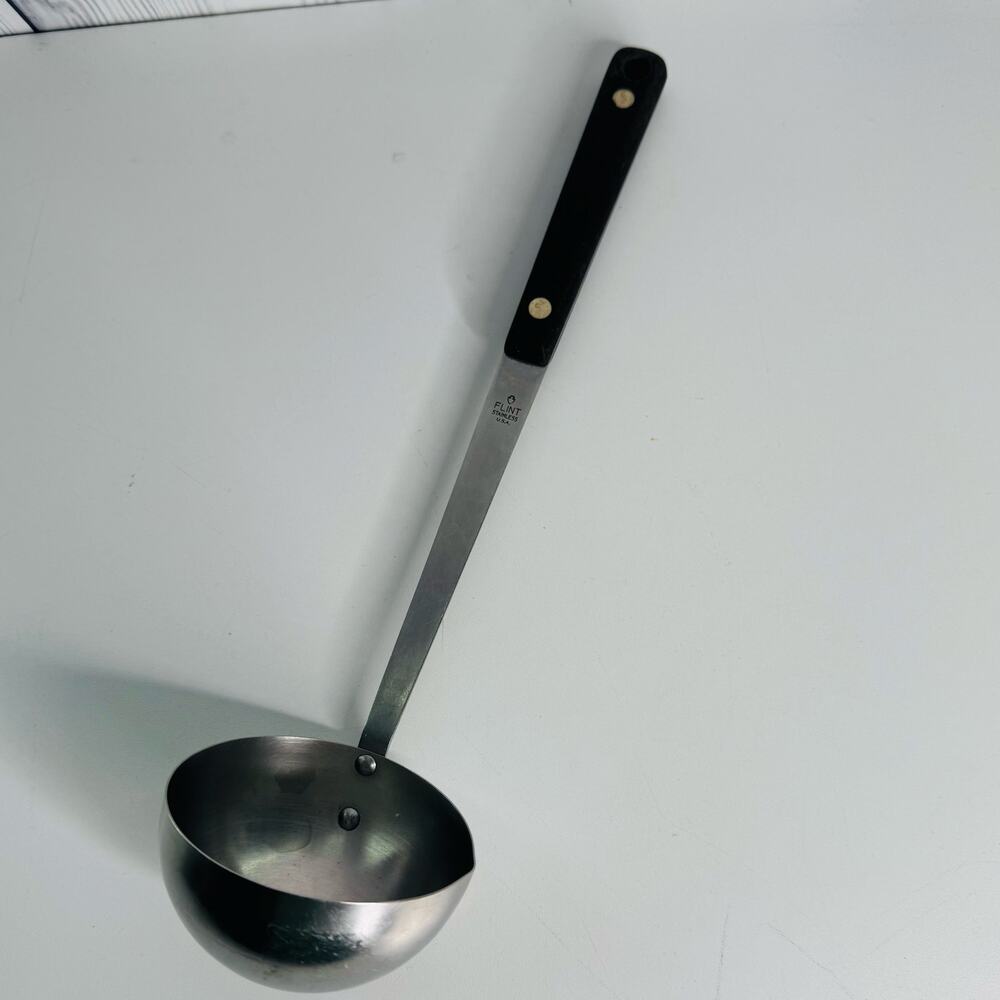 Vintage Flint Arrowhead Ladle Stainless Steel Riveted Black Composite Handle USA